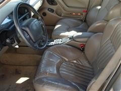 items/547a05519545e41180bf00155de1c209/1997pontiacbonnevillessei4doorsedan