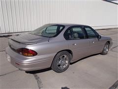 items/547a05519545e41180bf00155de1c209/1997pontiacbonnevillessei4doorsedan
