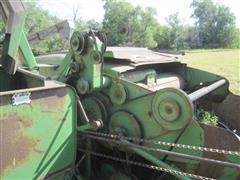 items/5ad65c559716e41180be00155de252ff/johndeere12acombinecombine