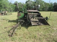 items/5ad65c559716e41180be00155de252ff/johndeere12acombinecombine