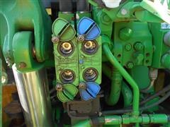items/5dfe32783618e41180be00155de252ff/2007johndeere7430premiummfwdtractor