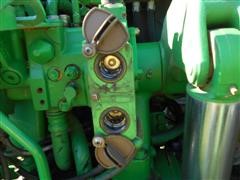 items/5dfe32783618e41180be00155de252ff/2007johndeere7430premiummfwdtractor