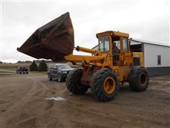 items/61c2297f764ae41180bf00155de1c209/1980johndeere644-bwheelloader