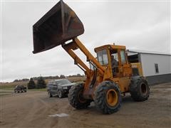 items/61c2297f764ae41180bf00155de1c209/1980johndeere644-bwheelloader