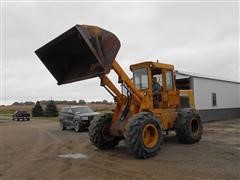 items/61c2297f764ae41180bf00155de1c209/1980johndeere644-bwheelloader