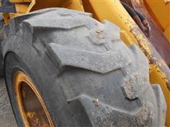 items/61c2297f764ae41180bf00155de1c209/1980johndeere644-bwheelloader