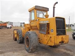 items/61c2297f764ae41180bf00155de1c209/1980johndeere644-bwheelloader