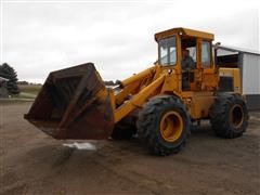 items/61c2297f764ae41180bf00155de1c209/1980johndeere644-bwheelloader