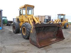 items/61c2297f764ae41180bf00155de1c209/1980johndeere644-bwheelloader