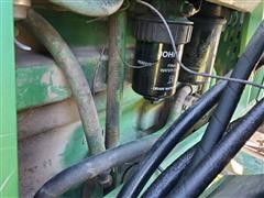 items/635127424afe461dbcbf81af10ef98b4/2000johndeere7410mfwdtractorwbushhog6045loader-4.jpg