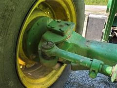 items/635127424afe461dbcbf81af10ef98b4/2000johndeere7410mfwdtractorwbushhog6045loader-74.jpg