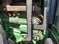 items/635127424afe461dbcbf81af10ef98b4/2000johndeere7410mfwdtractorwbushhog6045loader.jpg