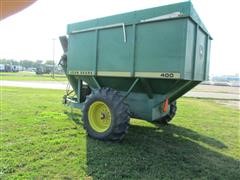 items/68996fa40240e41180be00155de1c209/johndeere400graincart-2