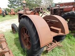 items/6ed4bce54729e41180be00155de252ff/1935mccormick-deeringw30tractor