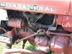 items/795b908cbc18e41180be00155de252ff/1965international424tractor