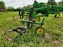 items/7c87b85d3ddf4c2390a00c80efc128ba/johndeere7256r30frontmountcultivator-19.jpg