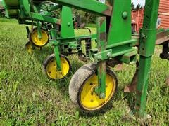 items/7c87b85d3ddf4c2390a00c80efc128ba/johndeere7256r30frontmountcultivator-28.jpg