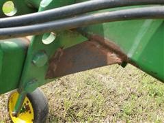 items/7c87b85d3ddf4c2390a00c80efc128ba/johndeere7256r30frontmountcultivator-32.jpg