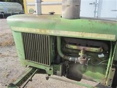 items/9c658fc29855e41180bd00155de187a0/johndeere2020tractor