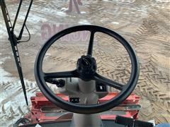 items/9e926709d041ea11b69800155d70e01b/caseih8120combine-84.jpg