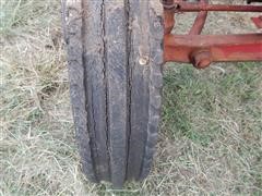 items/9f040b2a5929e41180be00155de252ff/1946mccormick-deeringw6tractor