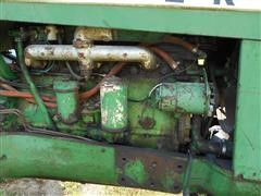 items/a0a8aaf7de28e41180be00155de252ff/1962oliver1800rowcroptractor