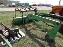 items/b2edccc76c2de41180bf00155de252ff/johndeere168loader