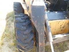 items/b981eba56a34e41180bc00155dd1091d/1998newhollandlx885turboskidsteer