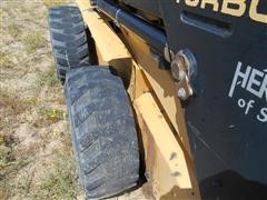 items/b981eba56a34e41180bc00155dd1091d/1998newhollandlx885turboskidsteer