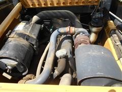 items/b981eba56a34e41180bc00155dd1091d/1998newhollandlx885turboskidsteer