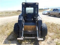 items/b981eba56a34e41180bc00155dd1091d/1998newhollandlx885turboskidsteer