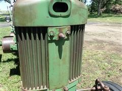 items/bfcb917160bdea11bf210003fff94c59/1961johndeere7302wdtractorwwidefront-30.jpg