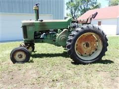 items/bfcb917160bdea11bf210003fff94c59/1961johndeere7302wdtractorwwidefront-9.jpg