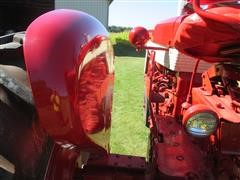 items/d3844c83774ae41180bf00155de1c209/1960ih460tractor