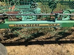 items/d41374d074edea11bf210003fff94c59/johndeere704v-rake_6ec628d10f884cad8ce976749c891b08.jpg