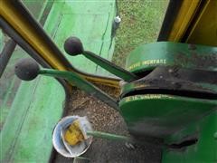 items/d5f471f8d228e41180be00155de252ff/unknownyearjohndeere105cornspecialcombine