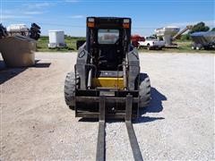 items/e0d649f16429e41180be00155de252ff/2008newhollandl180skidsteer