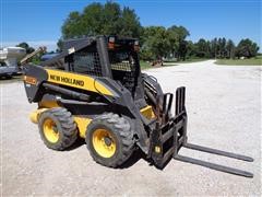 items/e0d649f16429e41180be00155de252ff/2008newhollandl180skidsteer