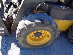 items/e0d649f16429e41180be00155de252ff/2008newhollandl180skidsteer