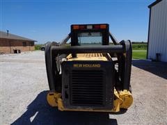 items/e0d649f16429e41180be00155de252ff/2008newhollandl180skidsteer