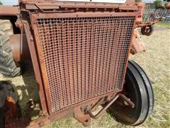 items/e6ccd1ba5129e41180be00155de252ff/mccormick-deeringw30tractor