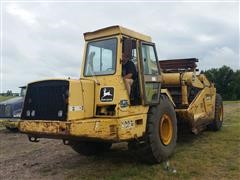 John Deere 862B Paddle Scraper 