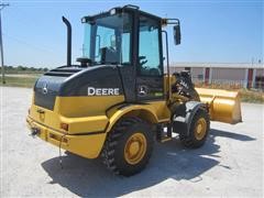 items/eb4e578a531ce41180be00155de252ff/2011johndeere244jloader