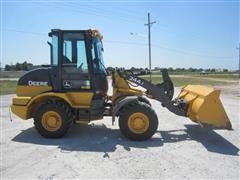 items/eb4e578a531ce41180be00155de252ff/2011johndeere244jloader