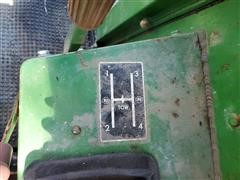 items/ee67a963150f4e13b58564263a42a295/johndeere7700turbocombine213platformheader-19.jpg