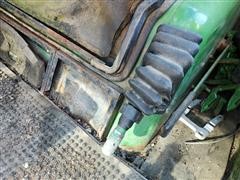 items/ee67a963150f4e13b58564263a42a295/johndeere7700turbocombine213platformheader-33.jpg