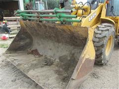 items/f6d54a3b1835e41180bc00155dd1091d/2003johndeere444hloader