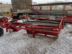 items/fe8a88cfa624e41180be00155de252ff/1979versaltile400windrower