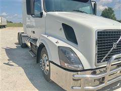 items/0196ee4a69724a03989f6f13c11ce55d/2012volvovnl64t670trucktractor_23172fa31a5747aeb5691d7d2e337baf.jpg