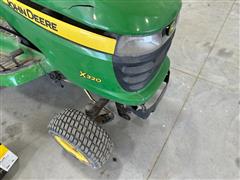 items/04974aa1563dee11a81c000d3a61103f/johndeerex320ridinglawnmower_78ebb199bdfb499d82a52490c15df996.jpg